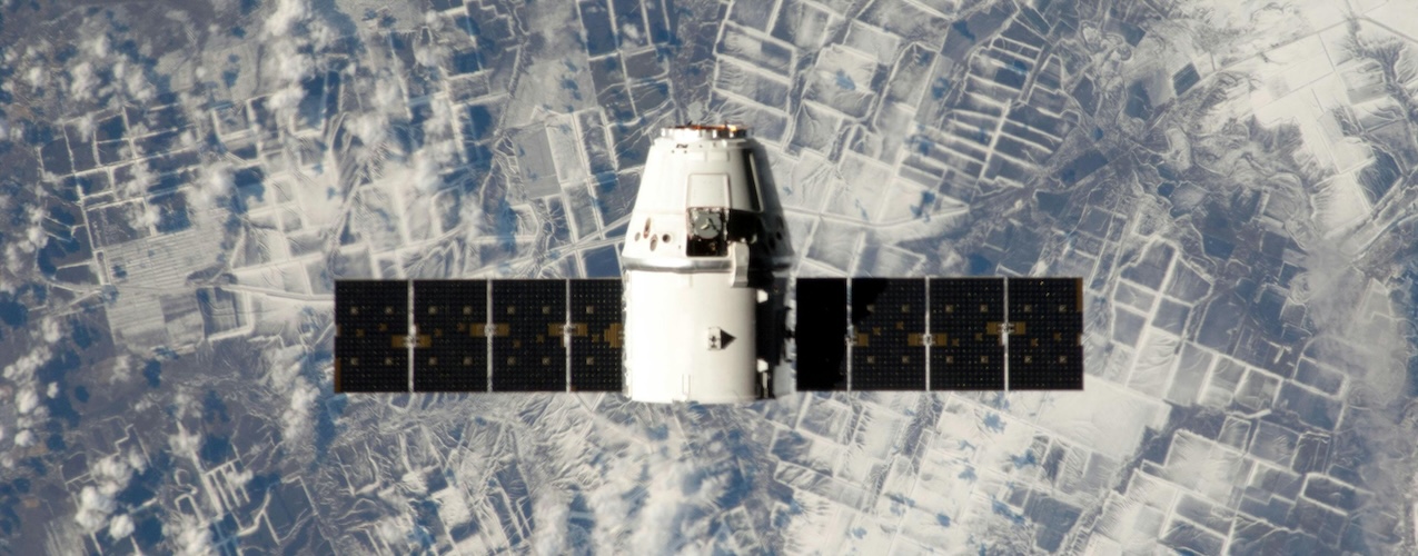 Photo from SpaceX showing a satellite over the earch